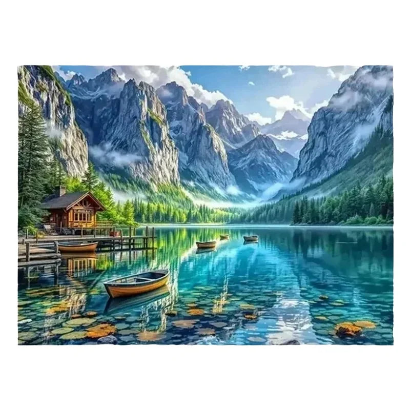 Broderie diamant d'un lac de montagne turquoise entouré de sommets, avec un chalet en bois et des barques