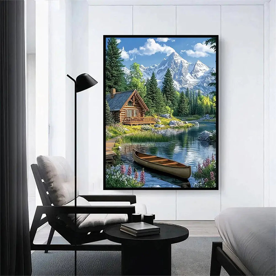 Tableau en diamants d'un chalet au bord d'un lac, encadré dans un salon